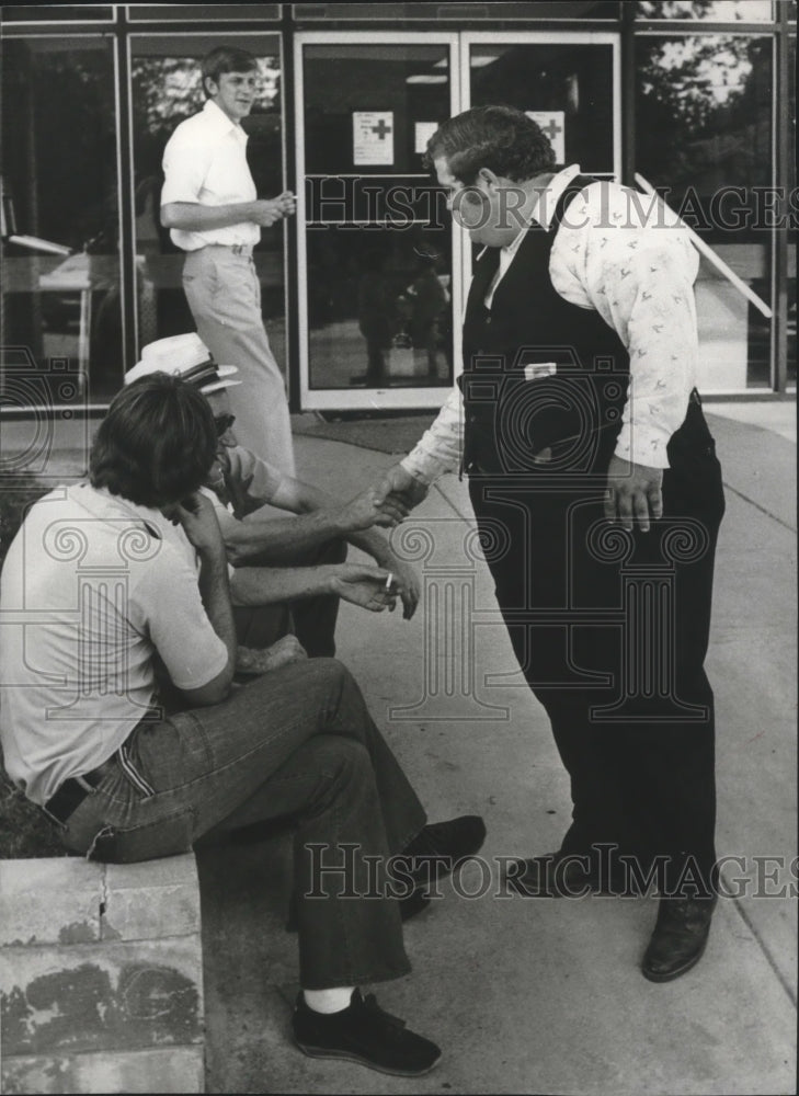 1978, David Millwood, greeting unidentified persons, Alabama - Historic Images