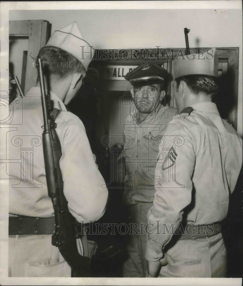 1954, Douglas McCluskey, arrested by National Guardsmen - abna36833 - Historic Images