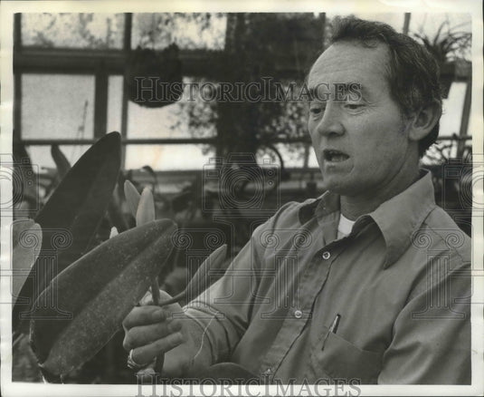 1974, Doctor Rick Leonard, chairman of the biology department, Orchid - Historic Images