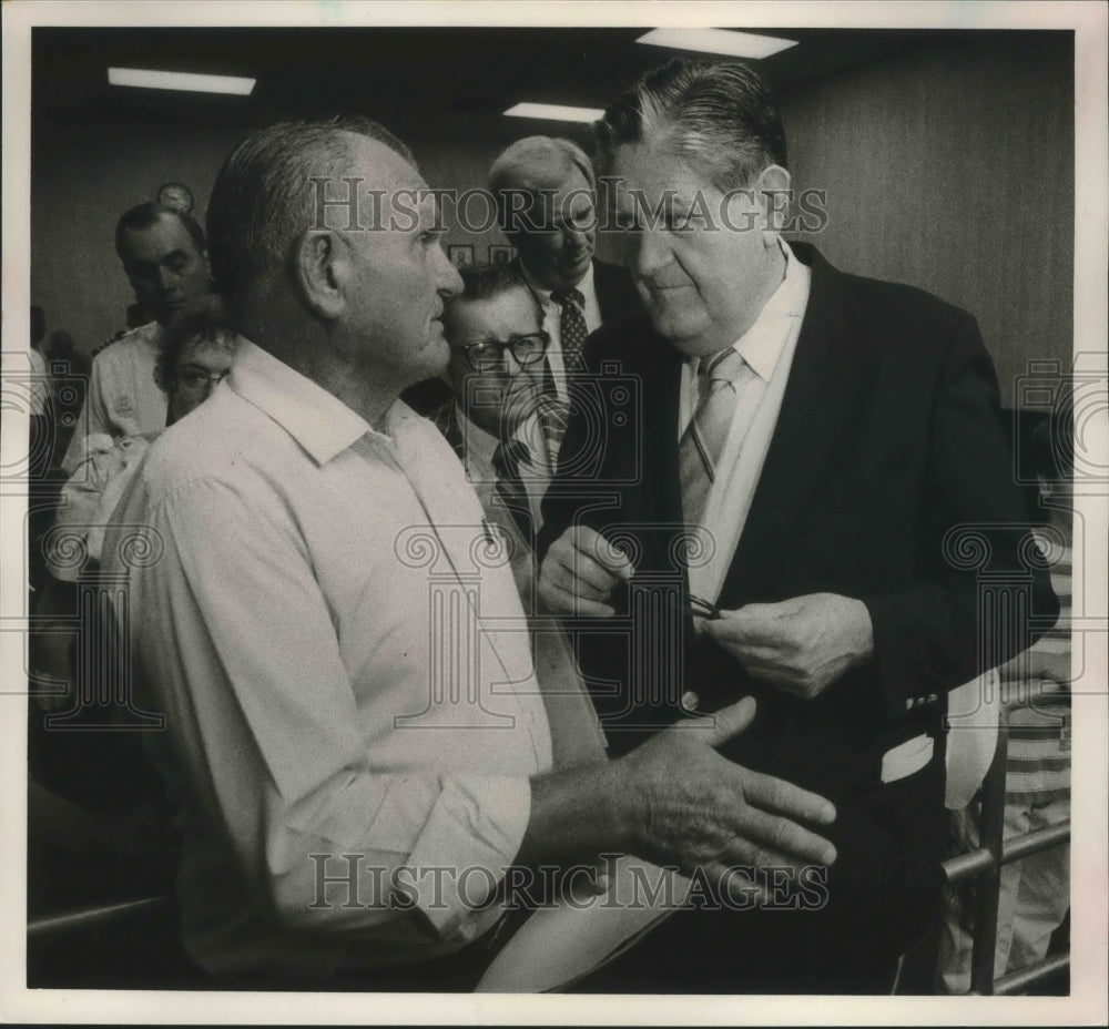 1989 Howell Heffin, US Senator, talks to Elbert Pannell, Alabama - Historic Images