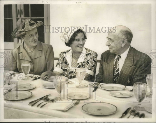 1950, Dr. Ruth Allcroft dines with Dr. Neige Todhunter and Dr. Harris - Historic Images
