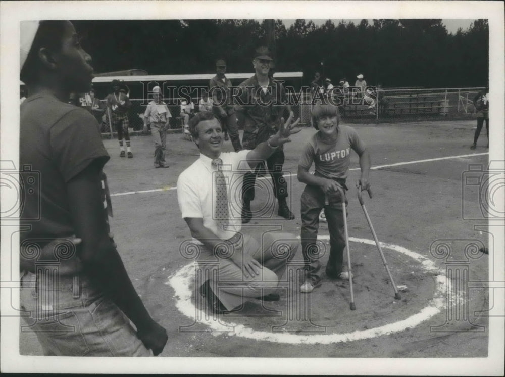 1980, State Senator Hinton Mitchem with Special Olympics Games Kids - Historic Images