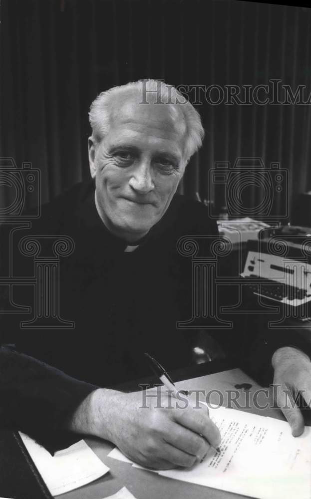 1976, Father Aloysius Plaisance, Priest of St. Bernard College - Historic Images