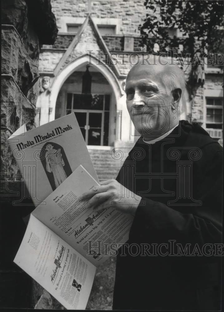 1981 Press Photo Father Aloysius Plaisance with his book - abna37969 - Historic Images