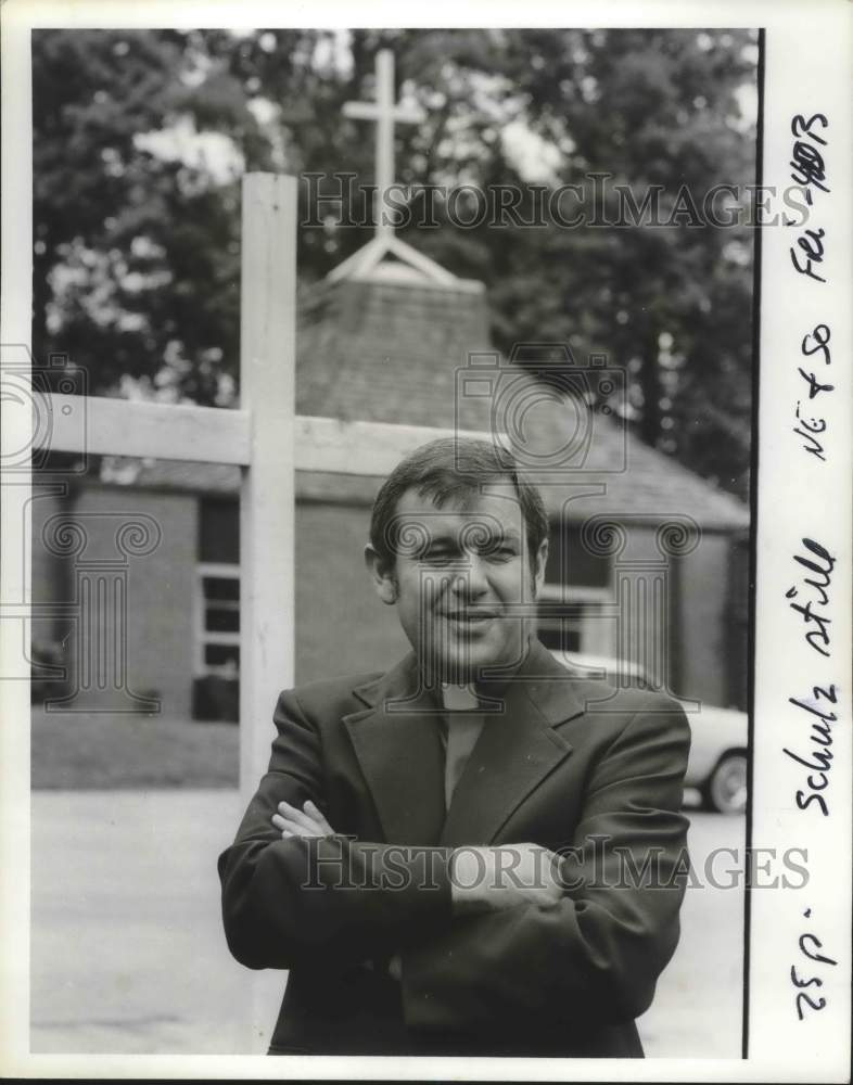 1980 Press Photo Clergyman Norman Schultz in front of church - abna38150 - Historic Images