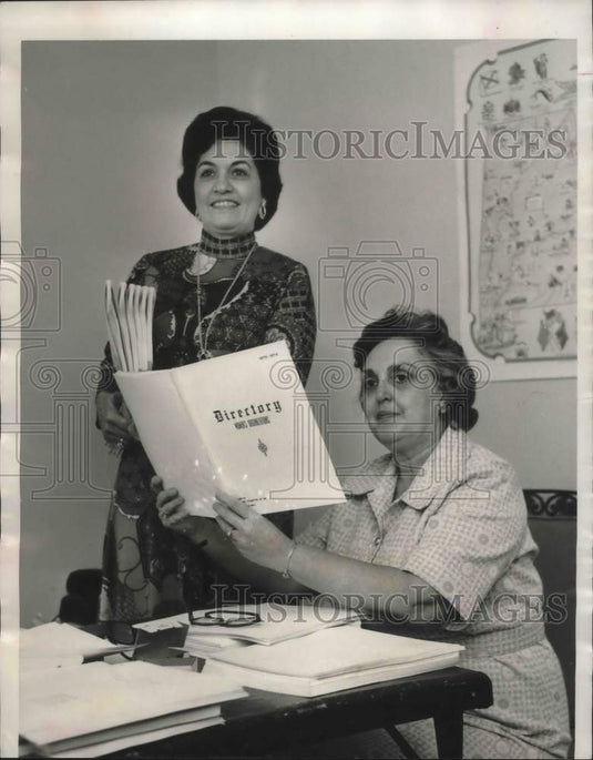 1973, Mrs. Hall, Mrs. H.A. Schulte with fresh printed directories - Historic Images