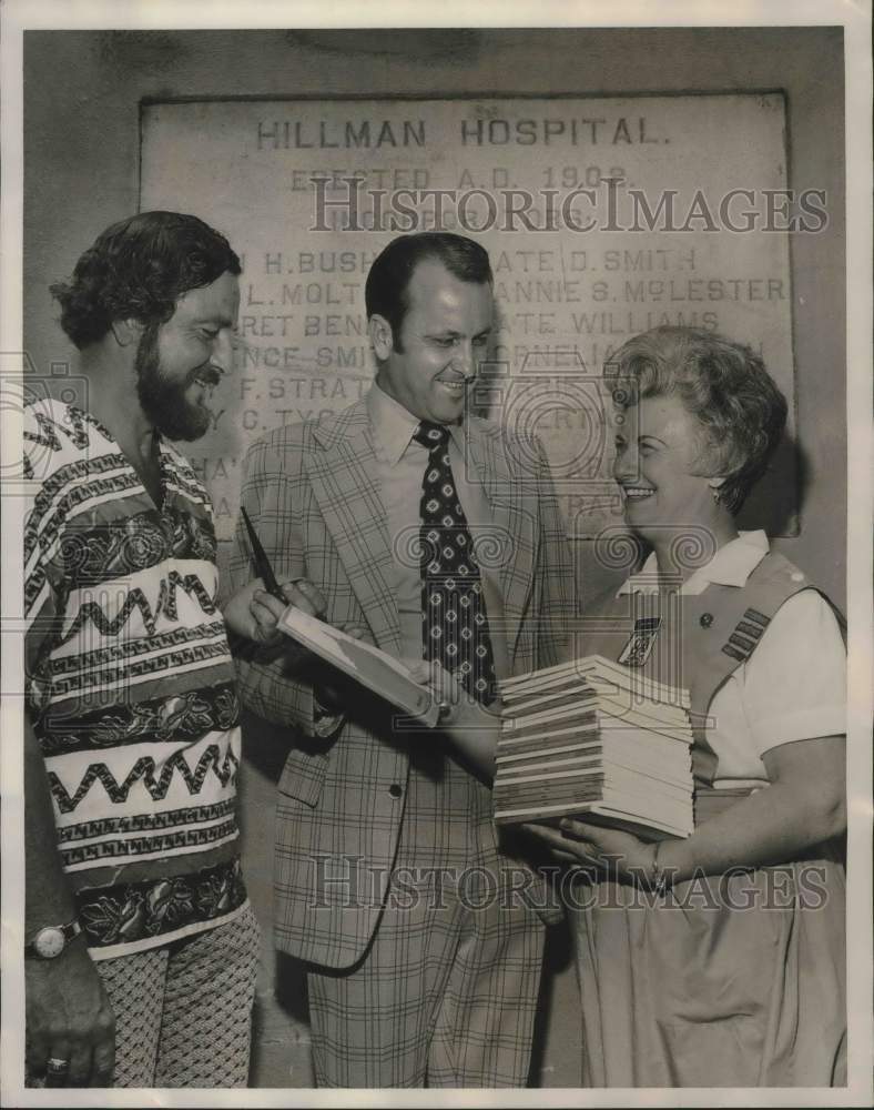 1974, James Moon &amp; others holding books by author Holmes - abna38175 - Historic Images