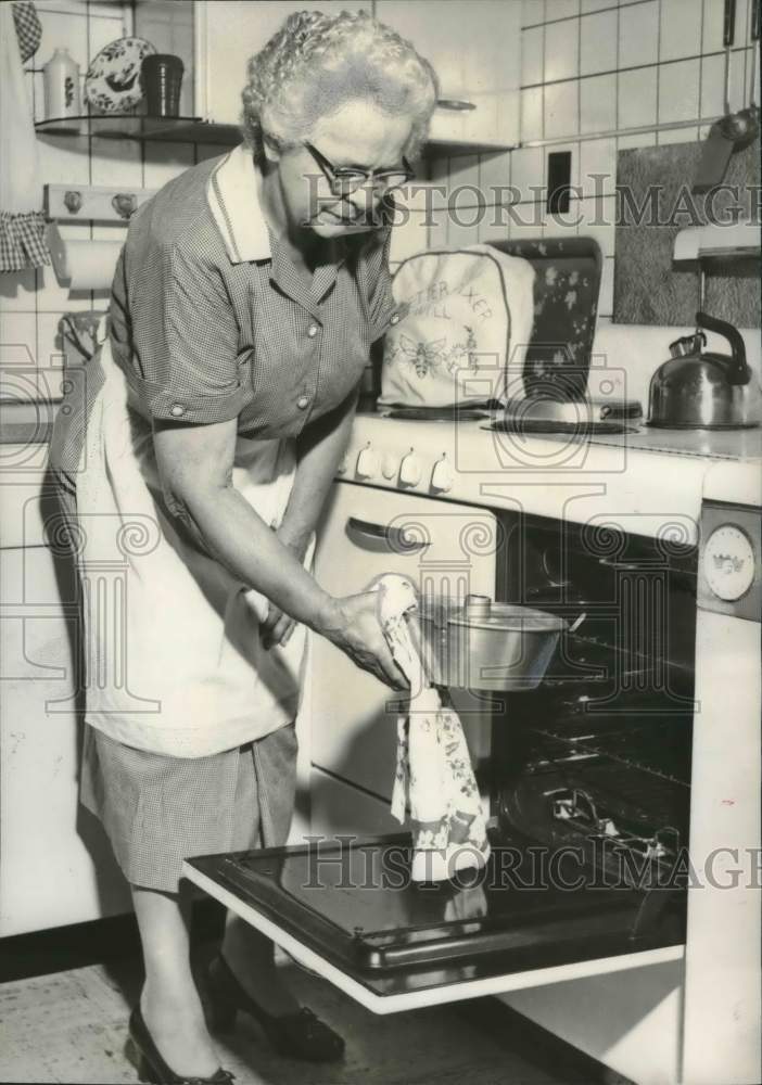 1958 Mrs. James E. Moore, Woman of the Year, Baking for Shut-ins - Historic Images