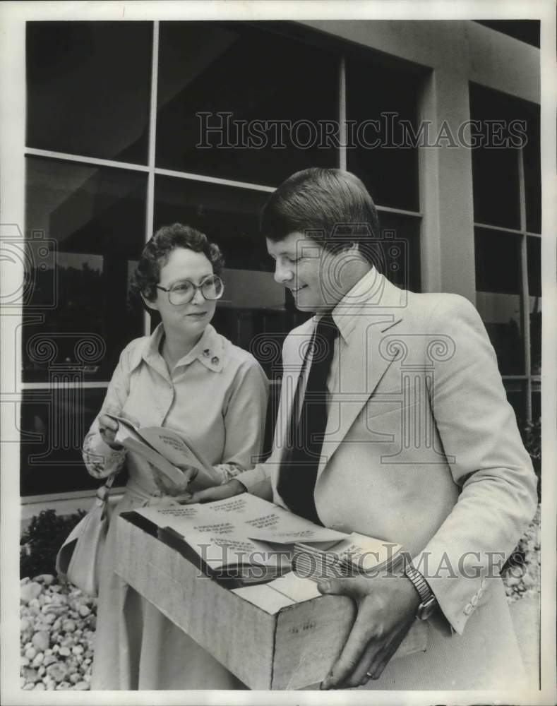 1978 Attorney Caryl Privett, Henderson Deliver Handbooks to Hospital - Historic Images