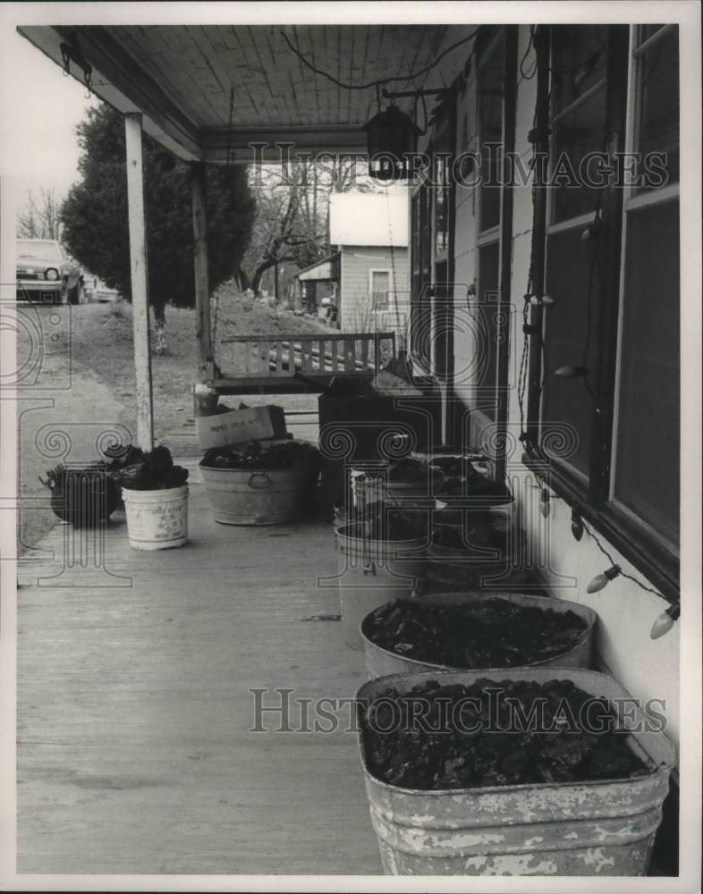 1987 Press Photo Coal on Porch of House in North Johns, Alabama - abna38653 - Historic Images