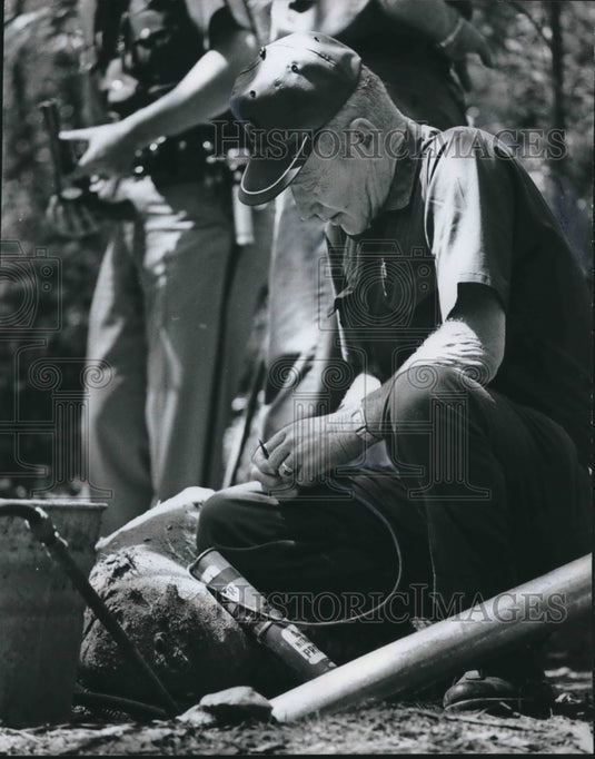 1972 Doss Prepares Explosive to Blow Up Still, Alabama - Historic Images