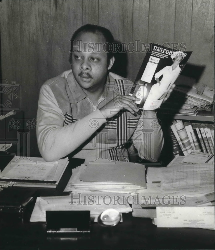 1979, Jesse Terry of Terry Manufacturing displays the sears catalog - Historic Images