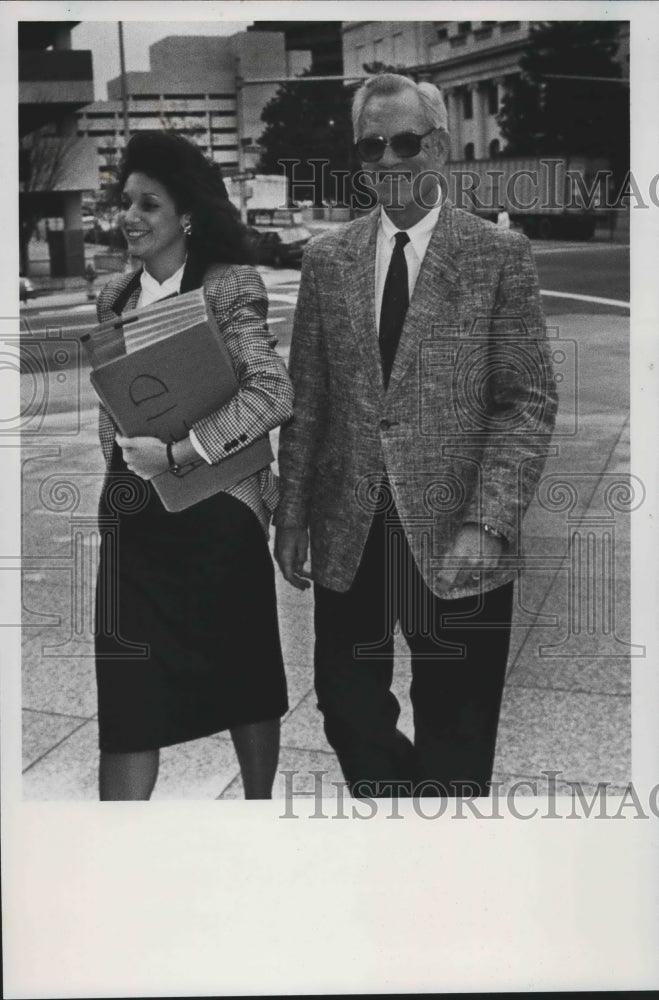 1990, Birmingham Water Worker and Sewer Board Joe Reid enters Court - Historic Images