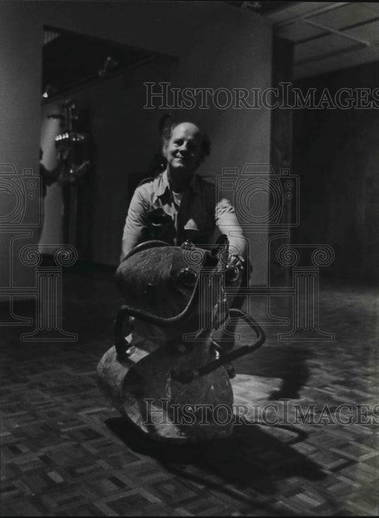 1984 Unidentified man riding on robot - Historic Images