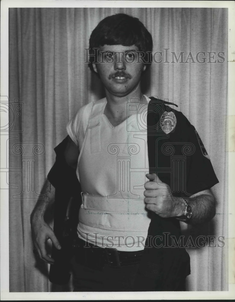 1980, Officer Bob Howell, showing new type bullet-proof vest, Alabama - Historic Images