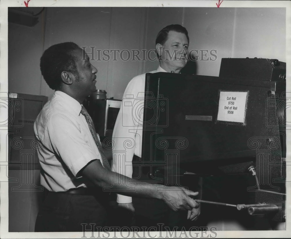 1975, X-Ray technician Ed Pharris, Ernest Herlong, South Central Bell - Historic Images