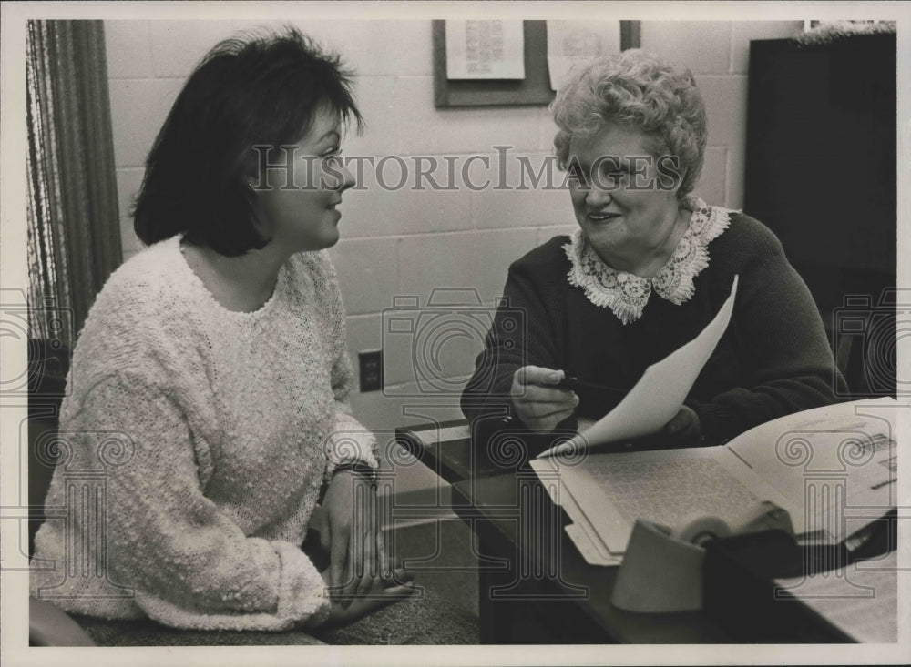 1988, Case Manager Freddie Akridge, right, interviews Theresa Roe - Historic Images