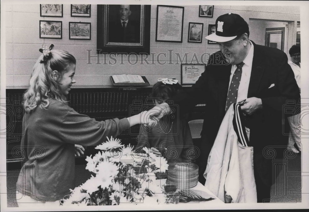 1990 Senator Howell Hefiln wearing McAdory cap greets Laura Ling - Historic Images