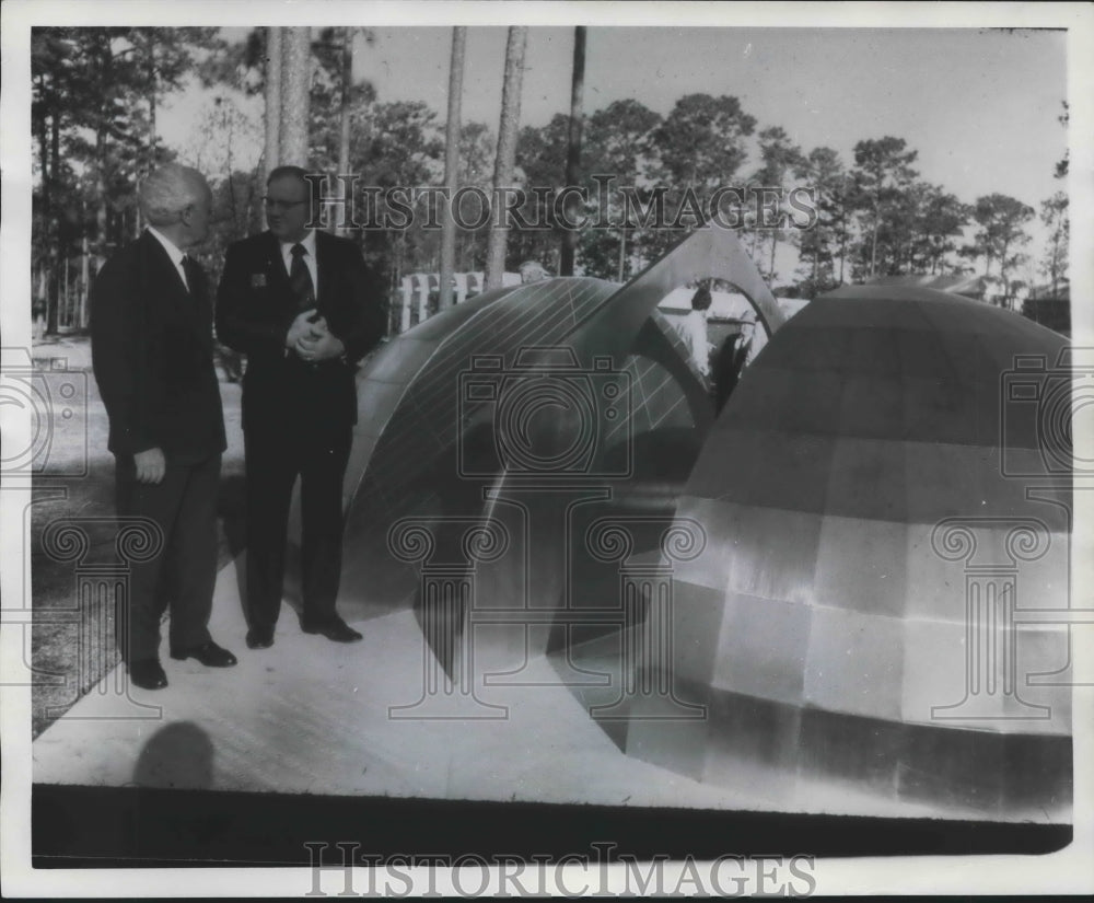 1977, Unidentified men by unique display at Riverchase, Alabama - Historic Images