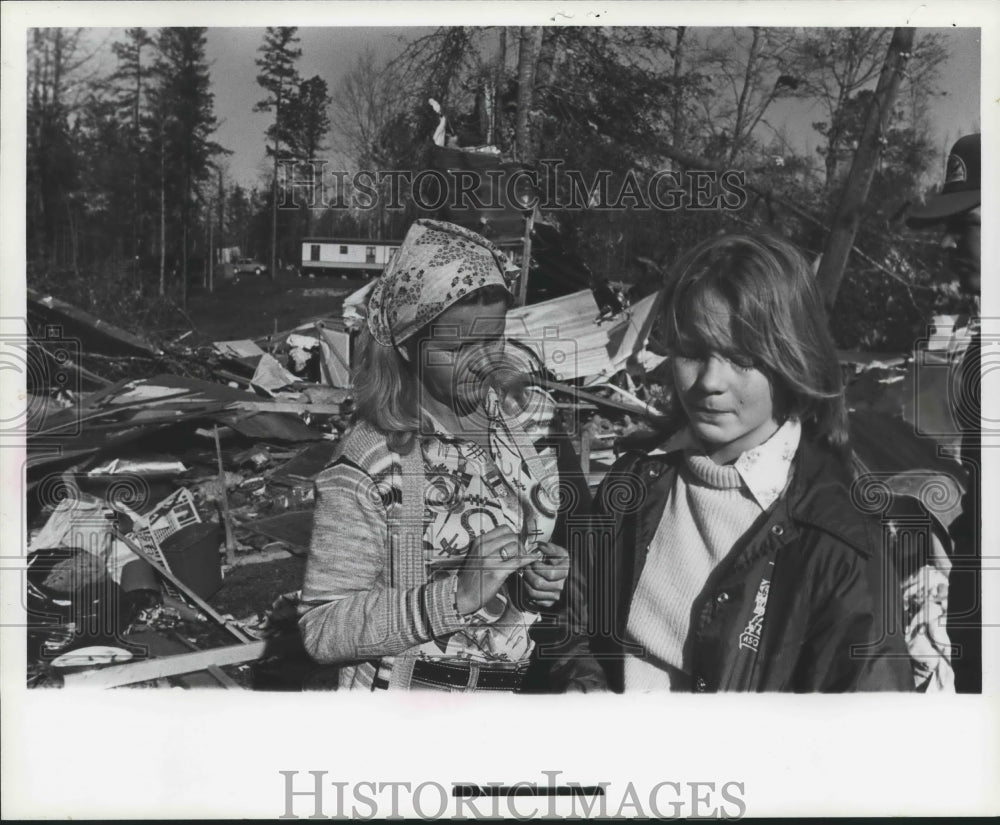 1982, Bevery Giles and Betty Baker upset by tornado damage in Alabama - Historic Images