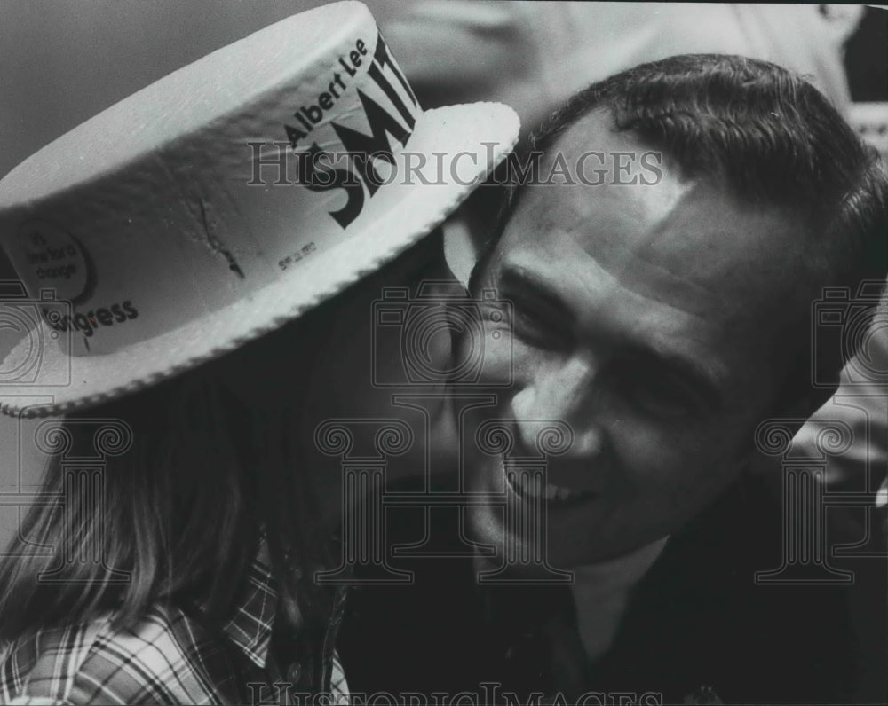 1980 Politician Albert Lee Smith gets kiss from daughter at election - Historic Images