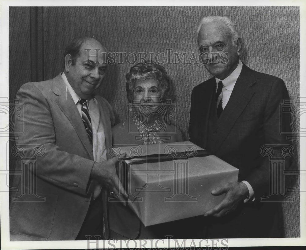 1981, Al and Phyllis Topazi get gift from Hanson, for Retirement - Historic Images