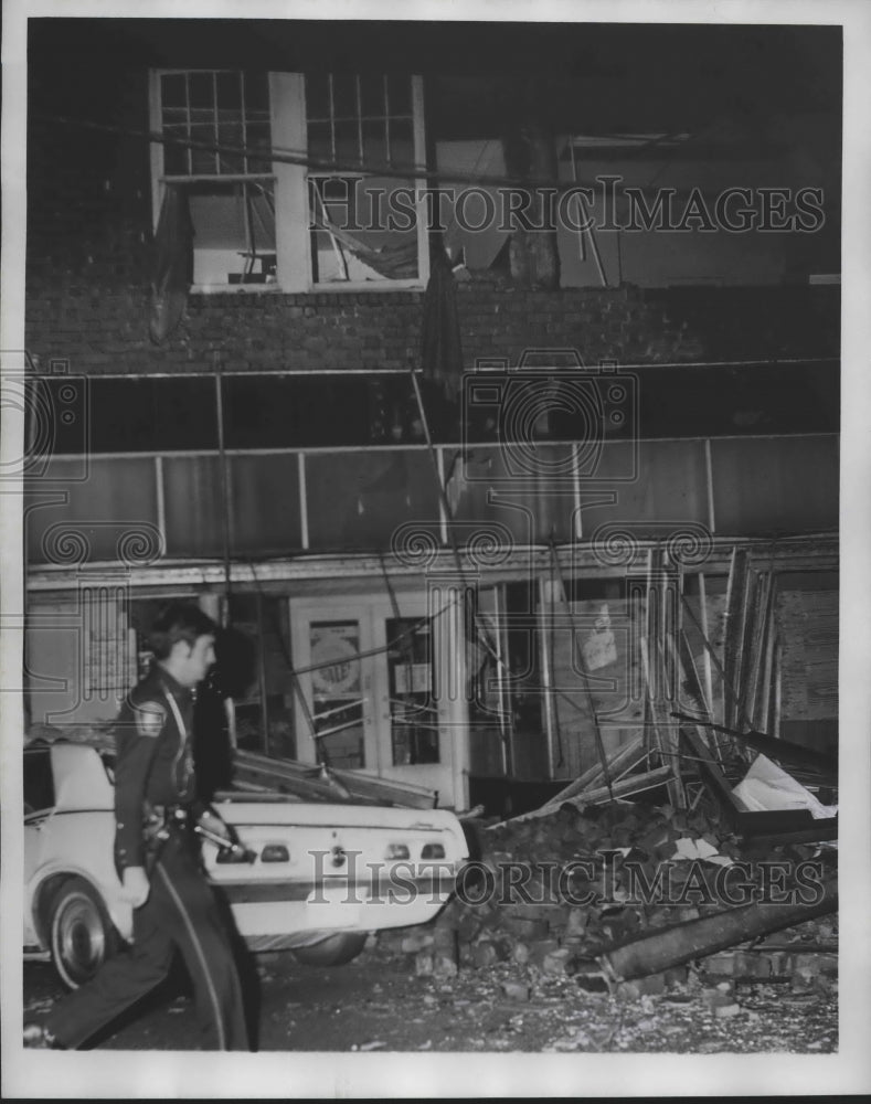 1975 Police Officer surveys damage after Tornado in Alabama Historic 1975 Police Officer surveys damage after Tornado in Alabama Historic
