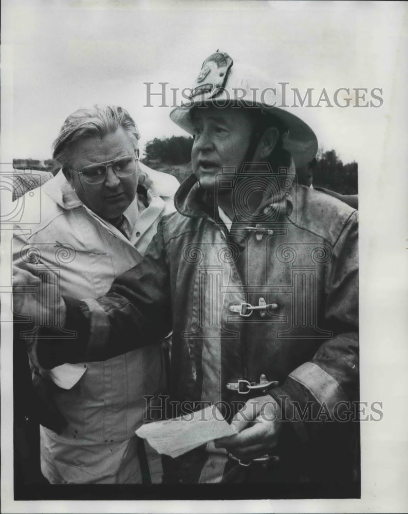 1977 Fire Chief speaks to Others after Jefferson County Tornado - Historic Images