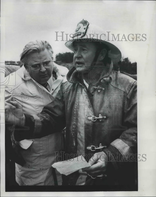 1977 Fire Chief speaks to Others after Jefferson County Tornado - Historic Images