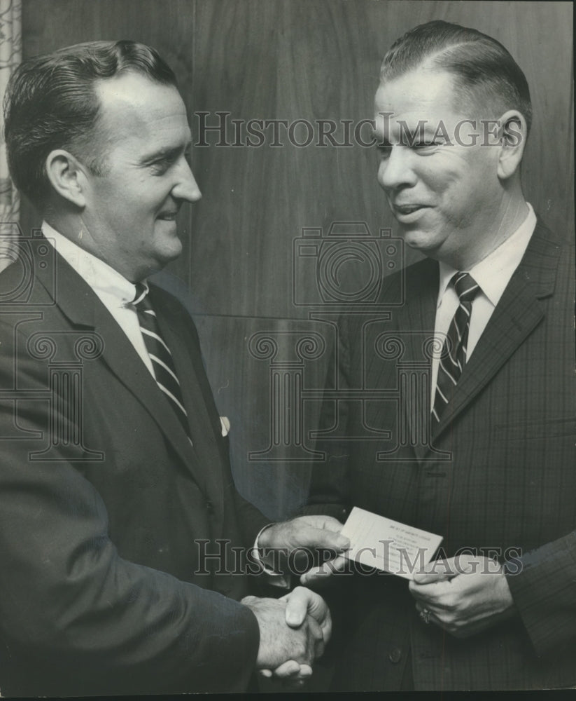 1962 Press Photo Mayor Arthur J. Hanes gives check to Pete McNeal for Hemophilia - Historic Images