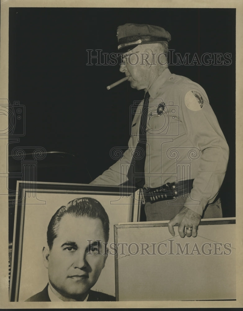 1968, Police Officer setting up picture of George C. Wallace - Historic Images