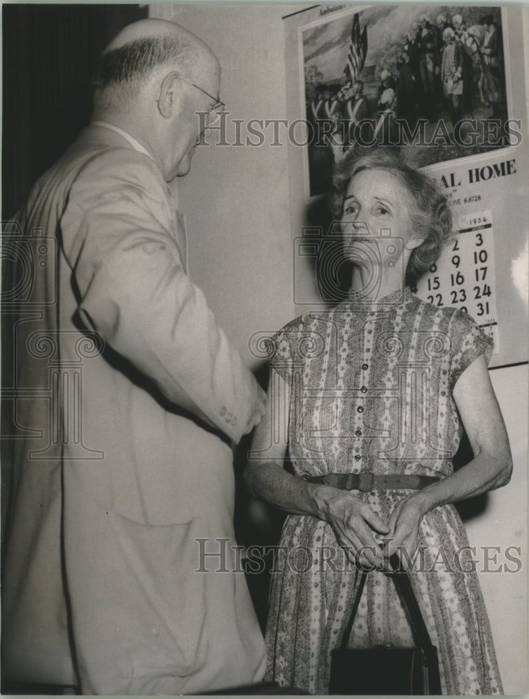 1954, Judge Walter James speaks with Mrs. Albert Patterson - Historic Images