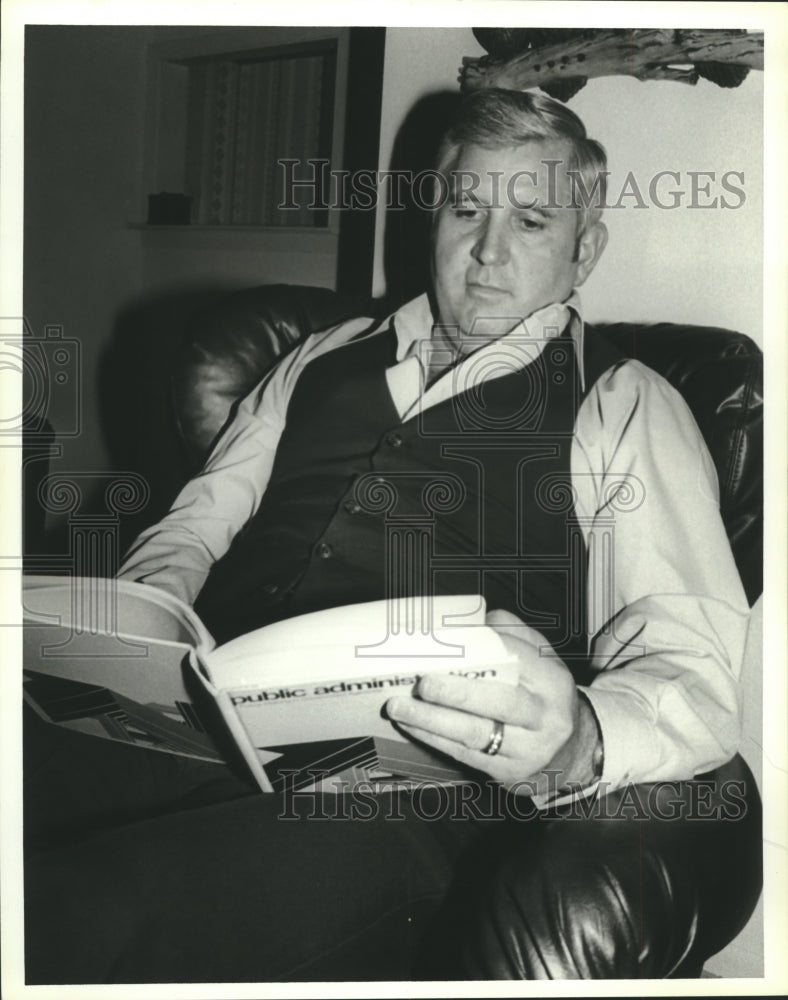 1978, James Parsons, New Orleans Police Chief, reading in his home - Historic Images