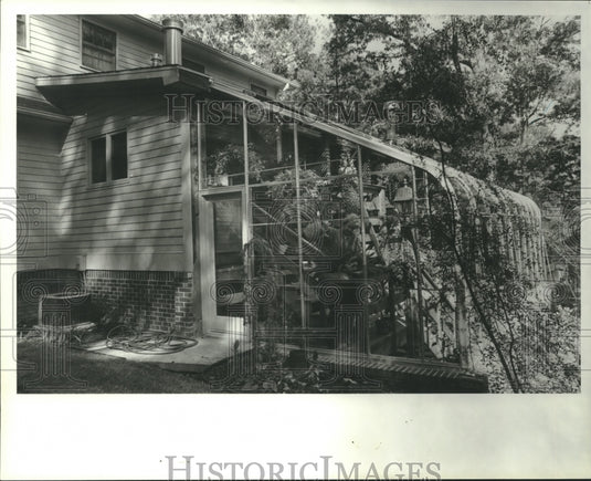 1988, Greenhouse attached to back porch of Mrs. G. W. Hallmark's Home - Historic Images