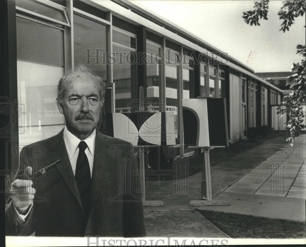 1980, Art Professor Raymond MacMahon with two of his paintings - Historic Images