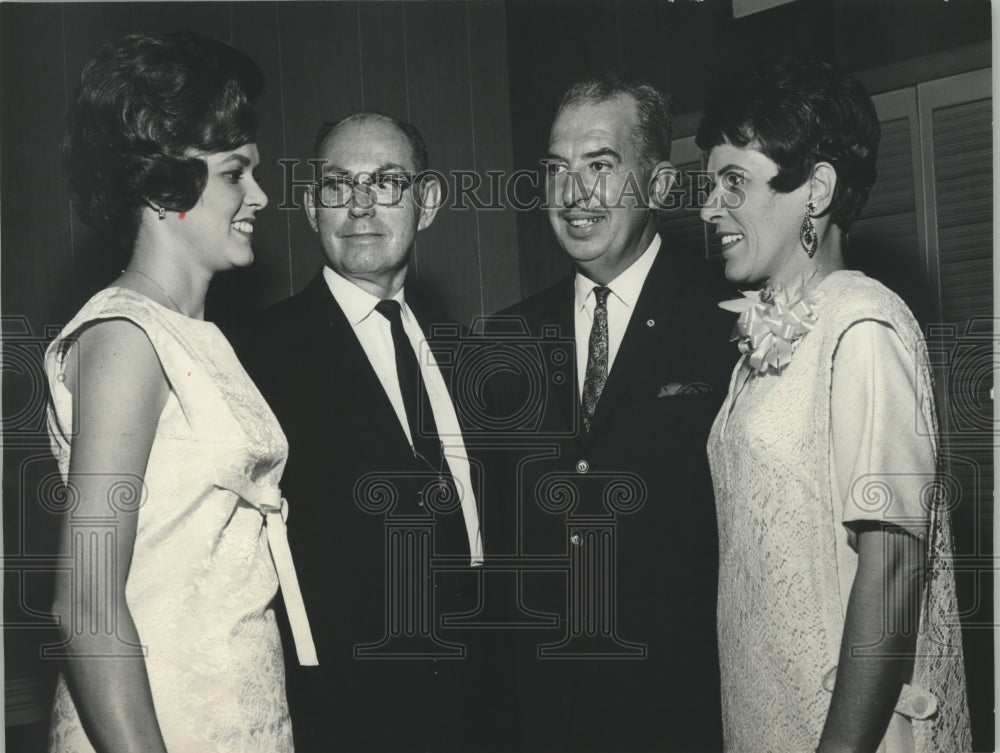 1966, Chamber of Commerce Members entertain Teachers with Dinner - Historic Images