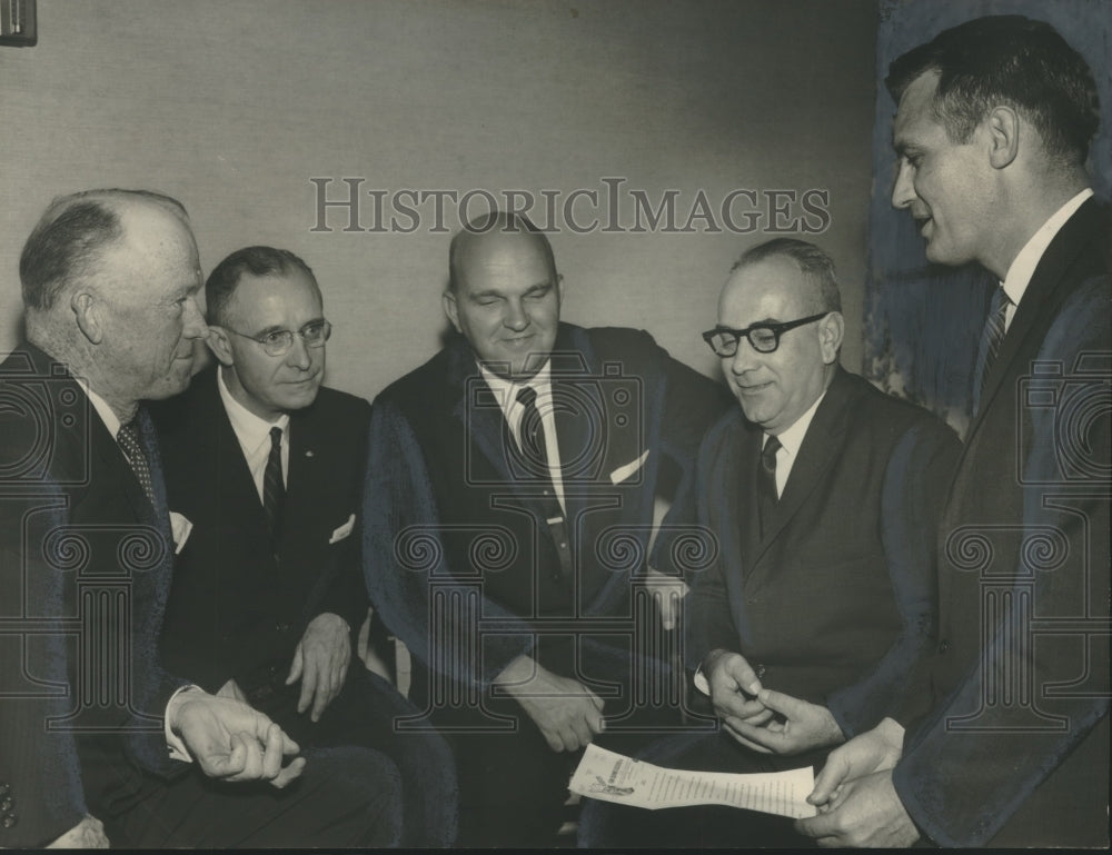 1960 Lieutenant Governor Albert Boutwell and Others discuss research - Historic Images