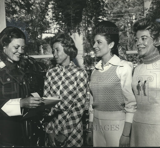 1973, Mrs. Sidney M. Smyer, Jr.& others discuss tennis rules in AL - Historic Images