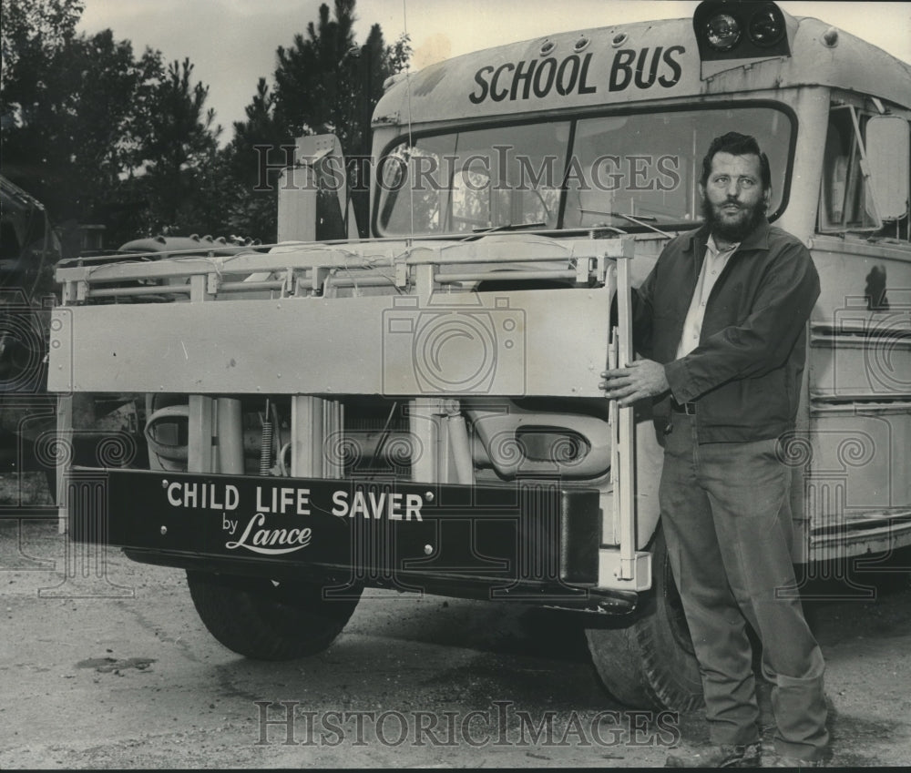 1974 Ralph Lance with &quot;Child Life Saver&quot; Invention and Bus - Historic Images