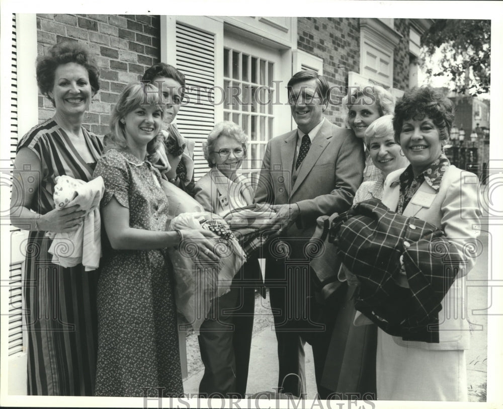 1987 Women&#39;s Council of Realtors with gifts for Hannah Home, Alabama - Historic Images