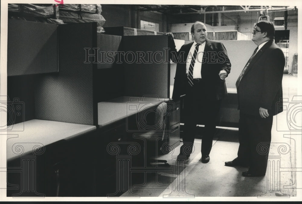 1989, Tommy Herring, associate prison commissioner, with Gene Giles - Historic Images