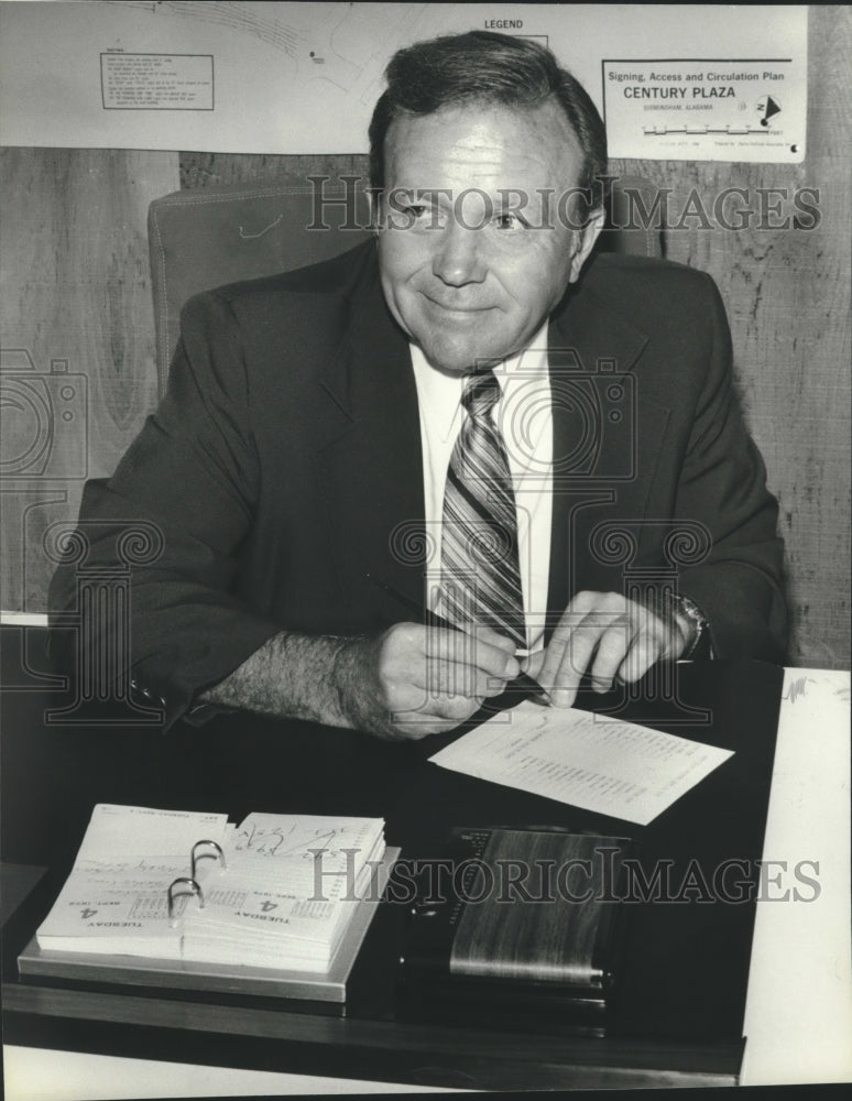 1979, R. V. Paulson, manager of Century Plaza at his desk, Alabama - Historic Images