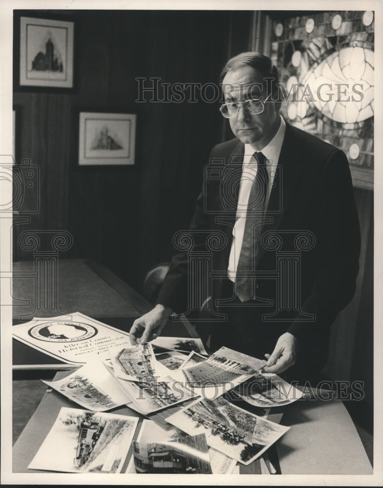 1989, Sam Rumore Looks over Old Photos - abna41702 - Historic Images