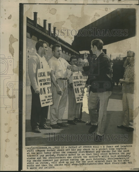 1959, Jones & Laughlin Steel Company Worker Shows Paycheck to Striker - Historic Images