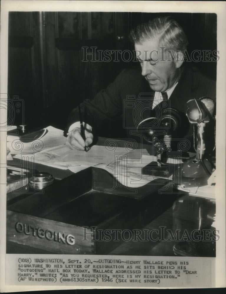 1946, Government official Henry Wallace signs letter in Washington - Historic Images