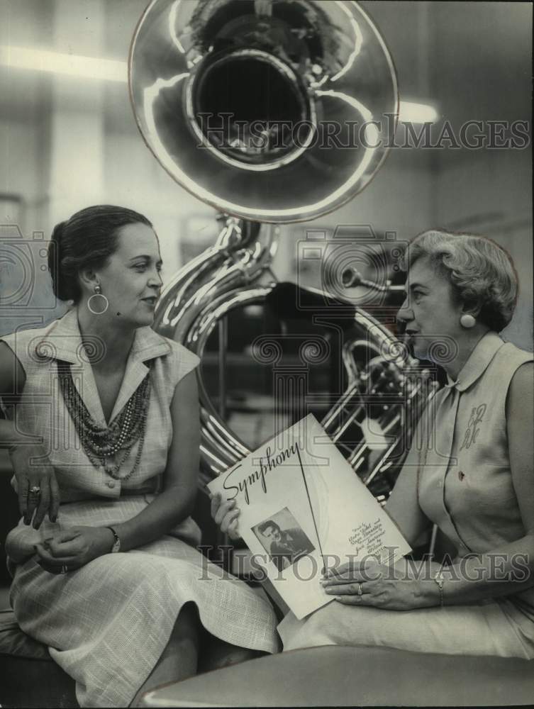 1957, Mrs. Walter Bouldin, Mrs. W.E. Tomlinson discuss symphony - Historic Images