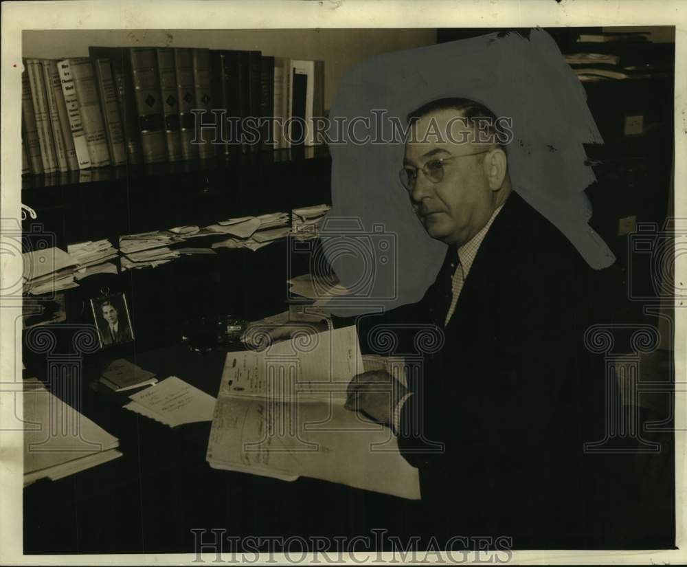 1942, State auditor John Brandon at desk - abna43421 - Historic Images