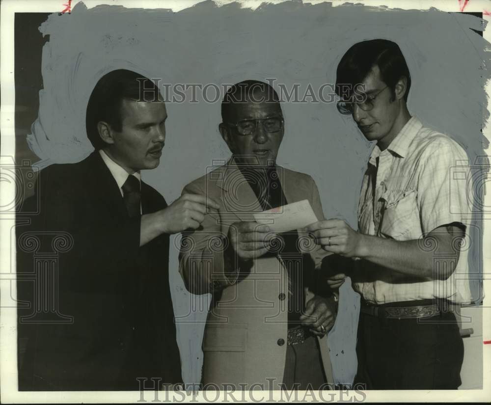 1973, Braswell goes over material with others in Alabama - abna43469 - Historic Images