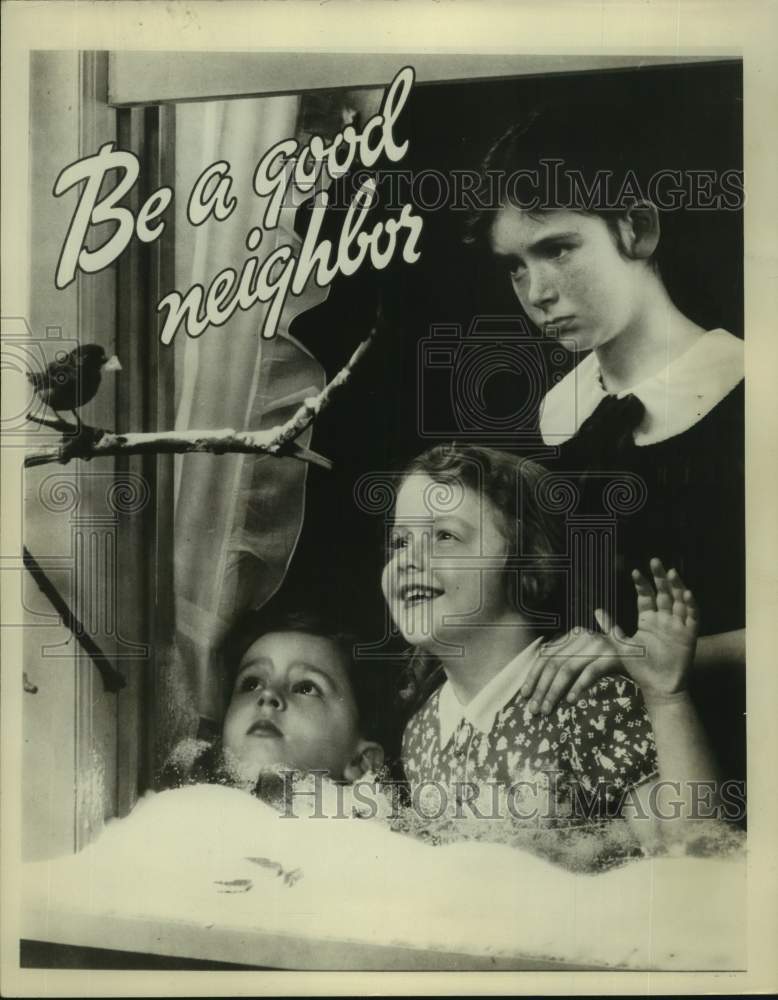 Press Photo Community Chest poster reading &quot;Be a good neighbor&quot; with 3 children - Historic Images