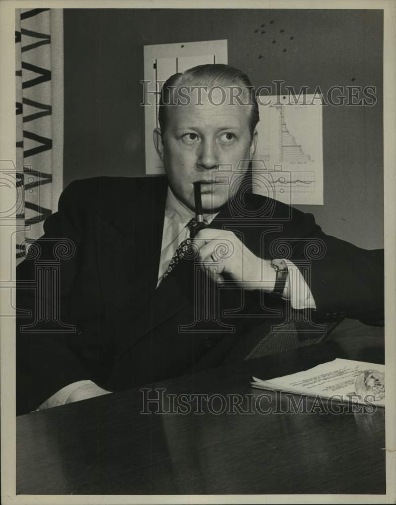 1948, Frank Stanton of radio, sitting at desk - abna43896 - Historic Images